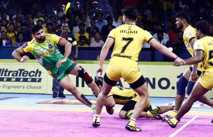 Patna Pirates star raider Pardeep Narwal ankle held by Telugu Titans Captain Abozar Mohajermighani Patna Pirates star raider Pardeep Narwal ankle held by Telugu Titans Captain Abozar Mohajermighani