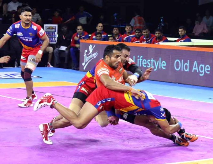Sandeep Narwal being tackled by UP Yoddha Sandeep Narwal being tackled by UP Yoddha