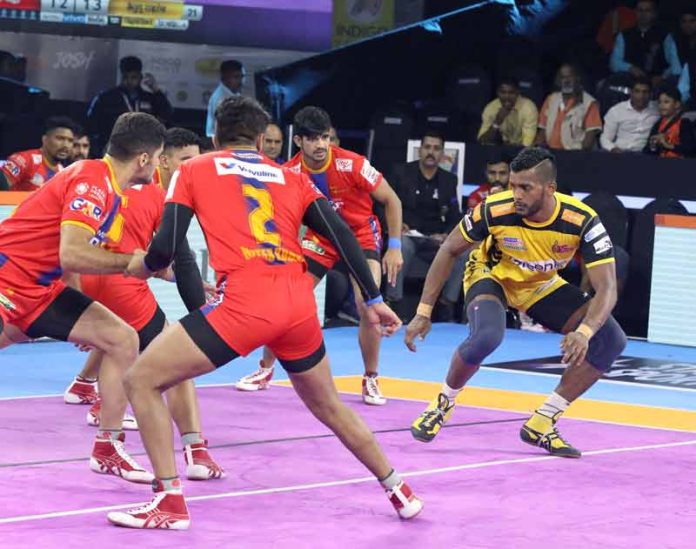 Telugu Titans star raider Siddharth Baahubali Desai at his raiding best against UPYoddha Telugu Titans star raider Siddharth Baahubali Desai at his raiding best against UPYoddha